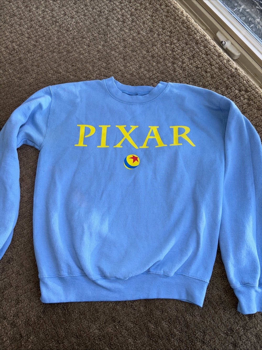 Pixar women’s small light Blue Crewneck Sweatshirt